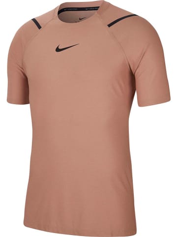 Nike Koszulka sportowa "Pro" w kolorze brzoskwiniowym