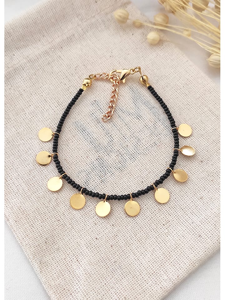 Vergulde armband met sierelementen