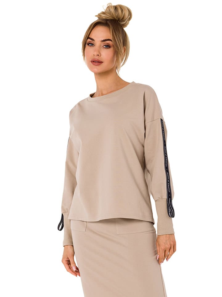 Sweter w kolorze beżowym