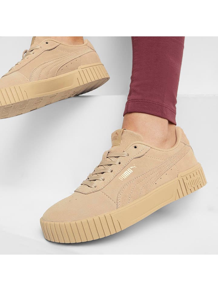Beige puma trainers top