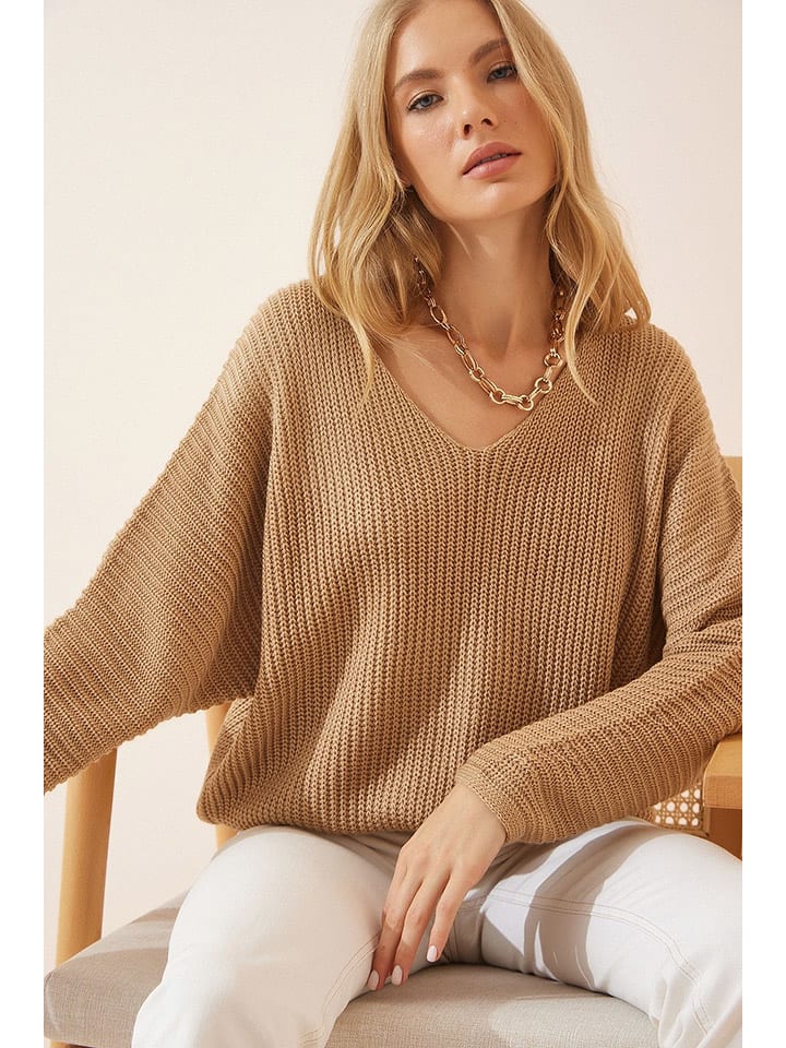 Sweter w kolorze beżowym
