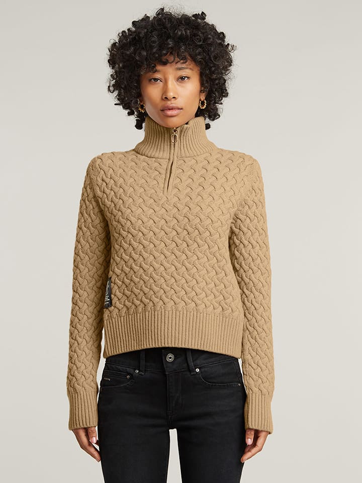 Sweter w kolorze beżowym