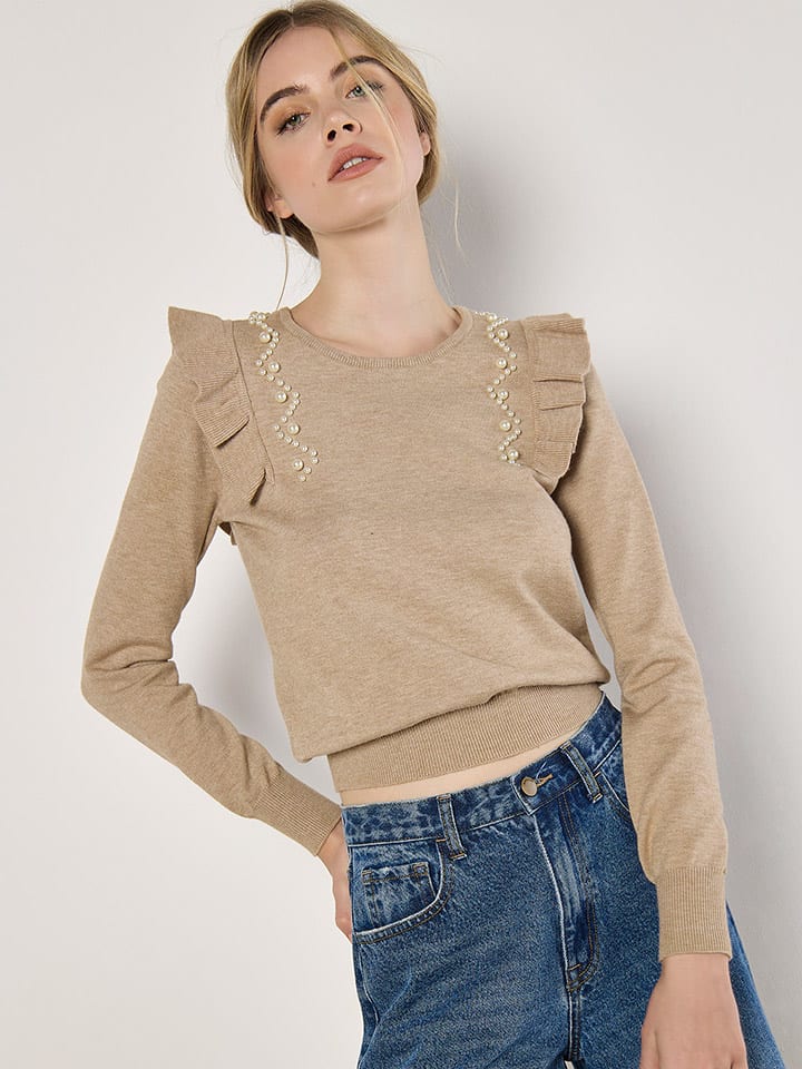 Sweter w kolorze beżowym