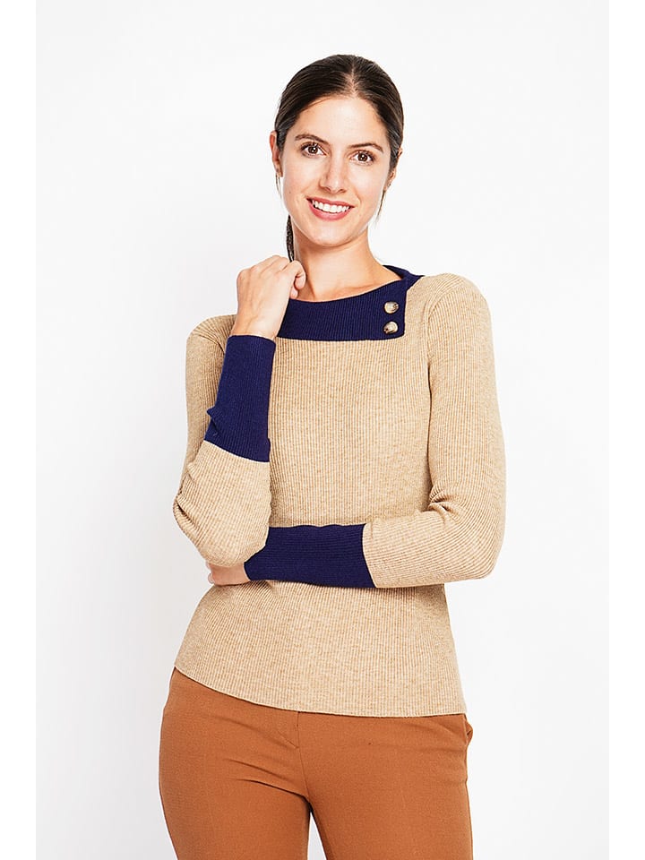 Sweter w kolorze beżowym