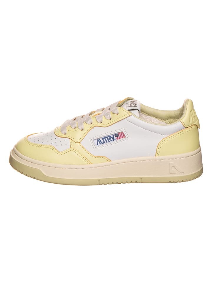 Skórzane sneakersy "Autry" w kolorze biało-żółtym