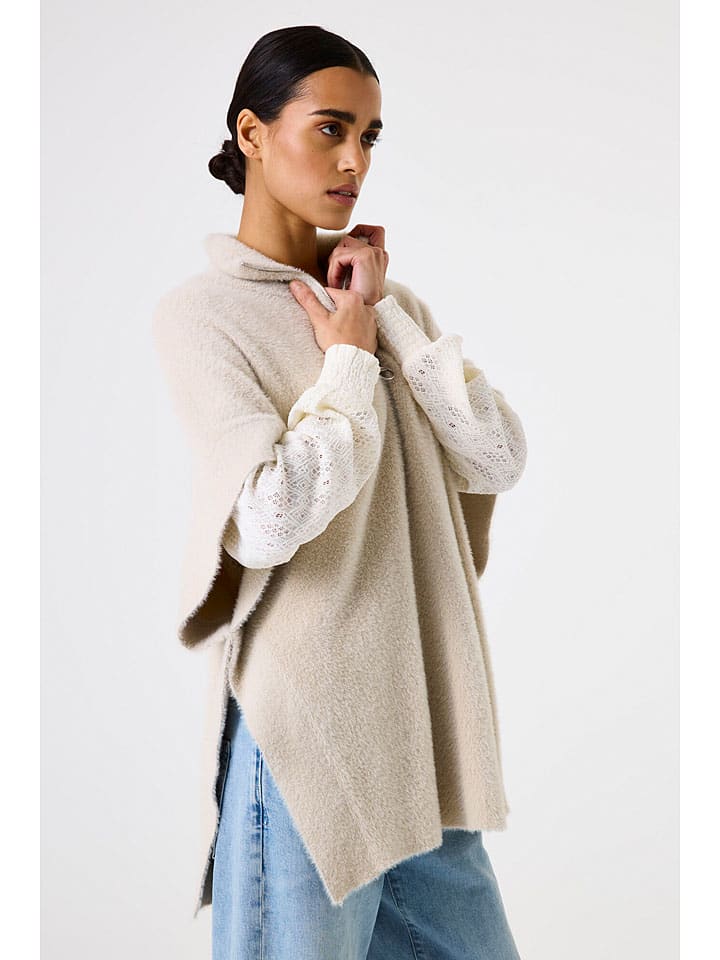 Sweter w kolorze beżowym