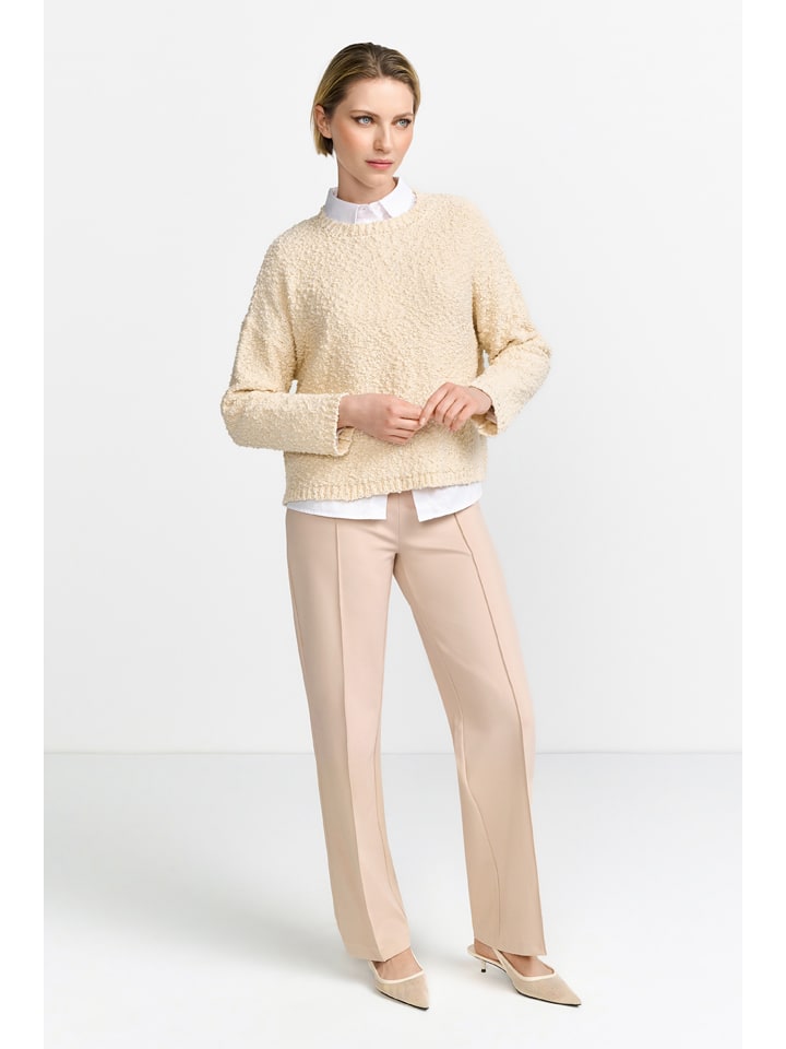 Sweter w kolorze beżowym