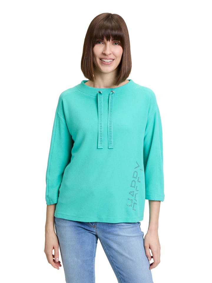 Bluza w kolorze turkusowym