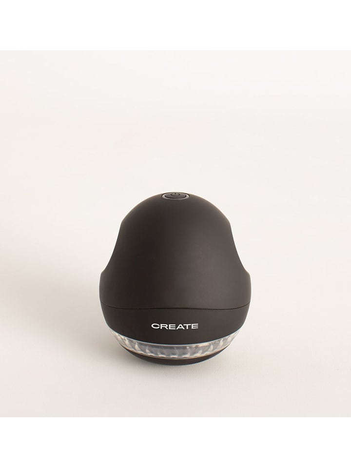 Elektryczna golarka w kolorze czarnym do ubrań - wys. 9 x Ø 12 cm