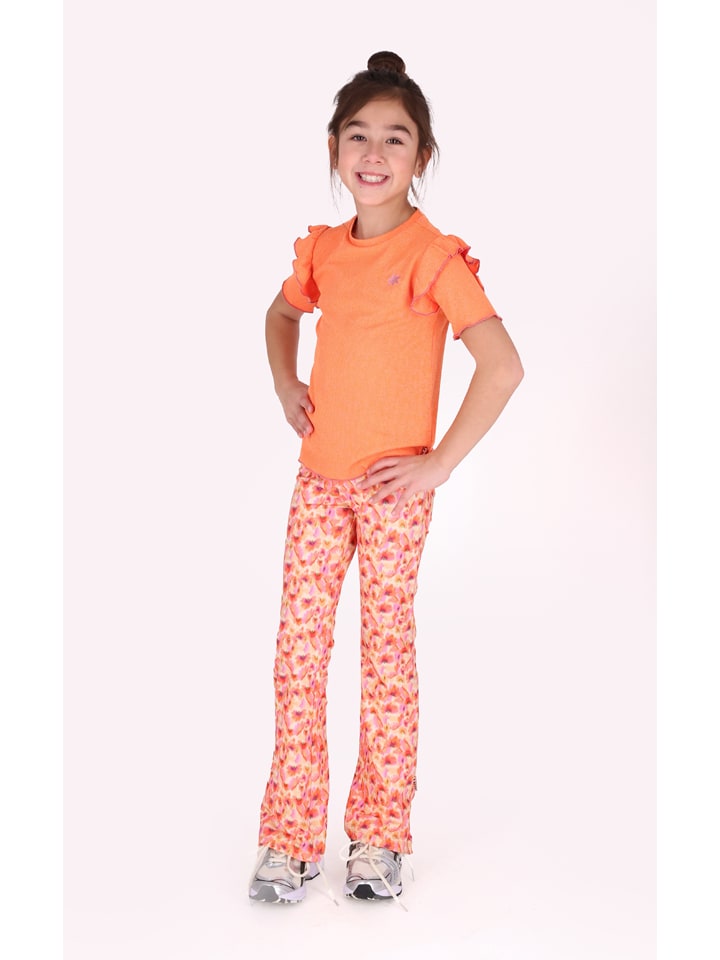 Legginsy "Phoebe" w kolorze żółto-pomarańczowym