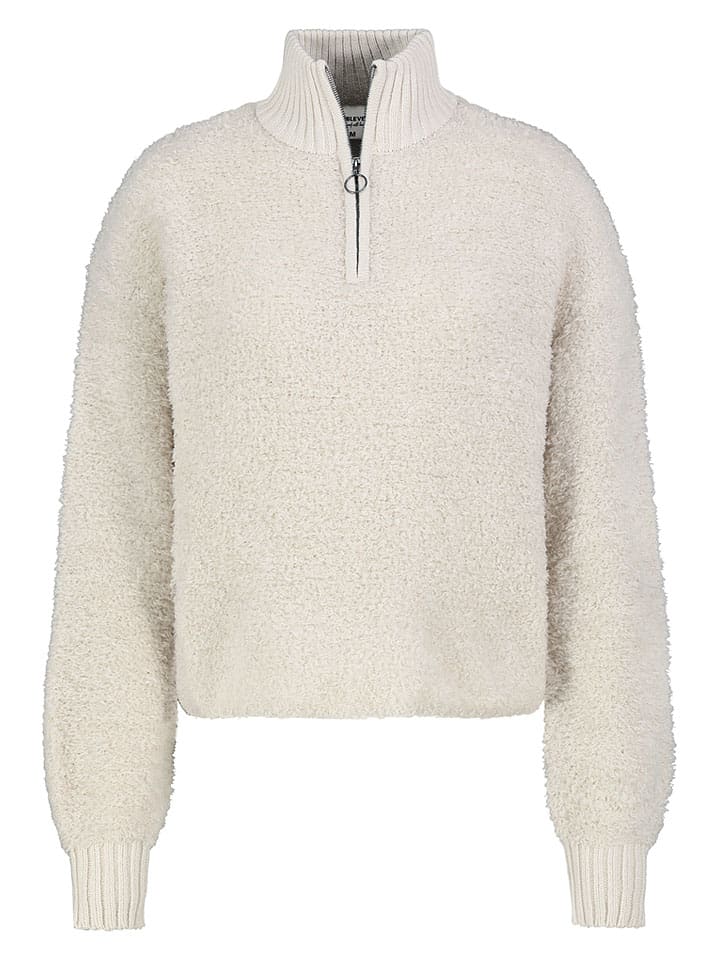 Sweter w kolorze beżowym