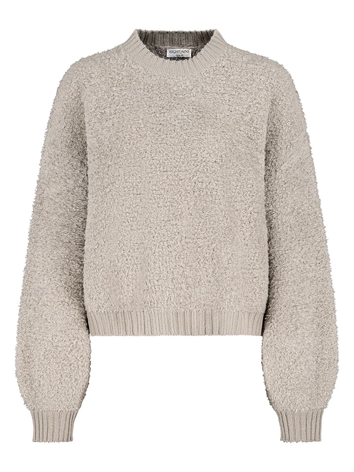 Sweter w kolorze beżowym