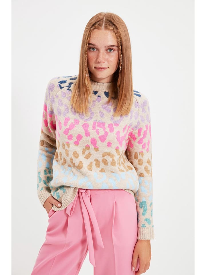 Sweter w kolorze beżowym ze wzorem
