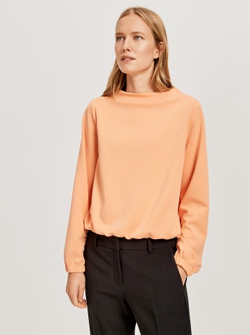 Someday Bluza "Gabbi" w kolorze brzoskwiniowym