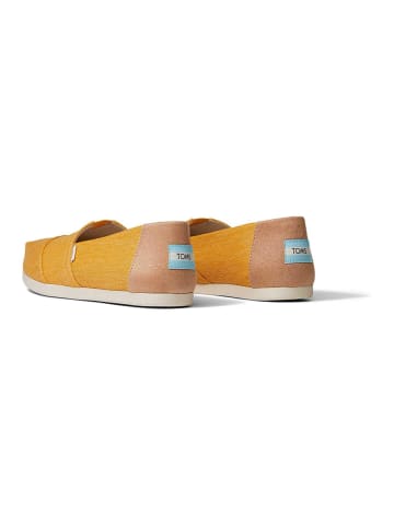 TOMS Slippersy w kolorze musztardowym