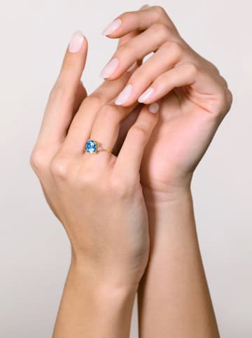 OR ÉCLAT Gouden ring "Espoir" met topaas