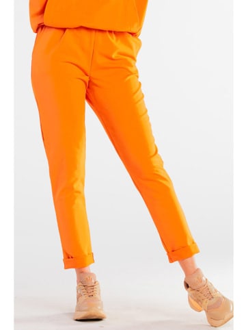 INFINITE YOU Spodnie w kolorze pomarańczowym