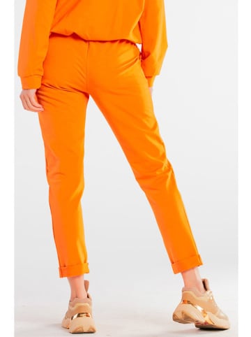 INFINITE YOU Spodnie w kolorze pomarańczowym