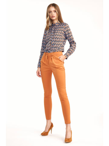 Nife Spodnie w kolorze pomarańczowym