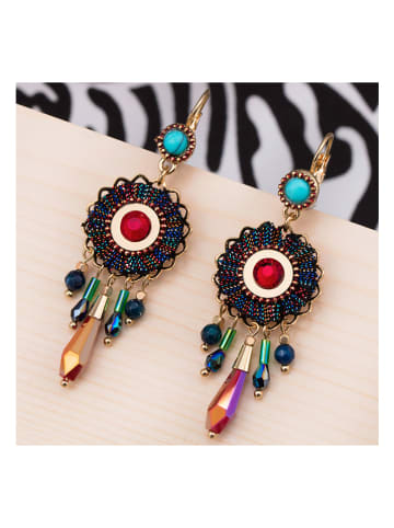 LA CHIQUITA Vergulde oorhangers met kristallen