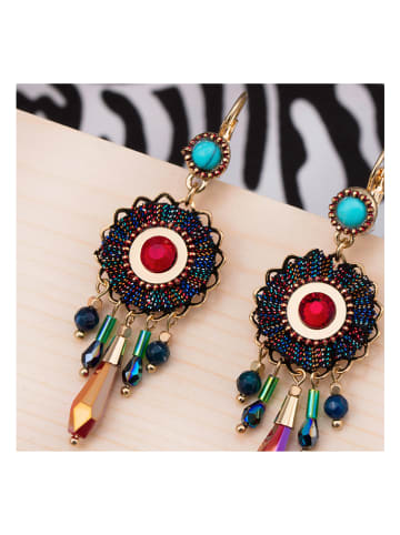 LA CHIQUITA Vergulde oorhangers met kristallen