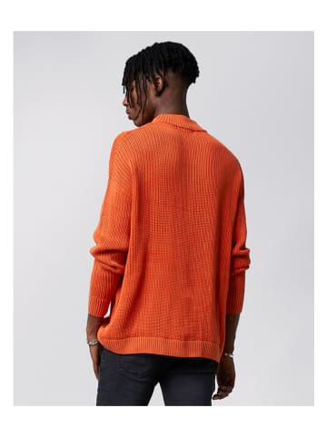 Tigha Sweter w kolorze pomarańczowym