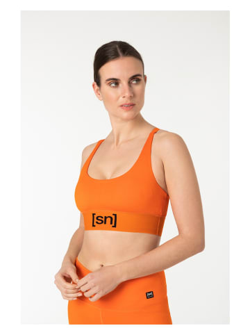 super.natural Sportbeha oranje - low