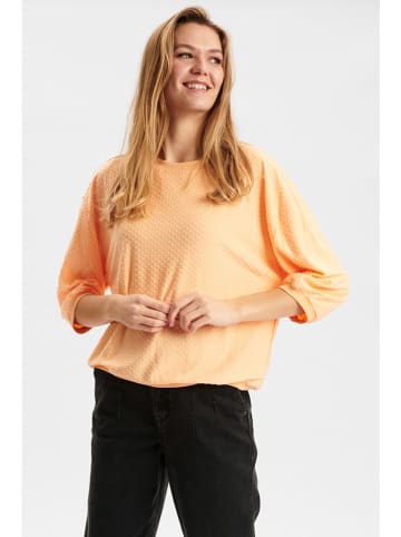 NÜMPH Koszulka "Nubrighed Dobby" w kolorze brzoskwiniowym