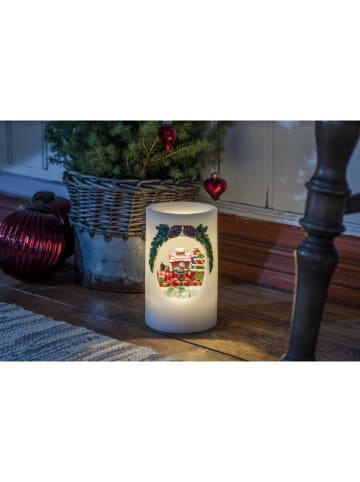 Konstsmide LED-Echtwachskerze "Schneemann mit Zug" in Weiß/ Bunt - (H)16 x Ø 10 cm