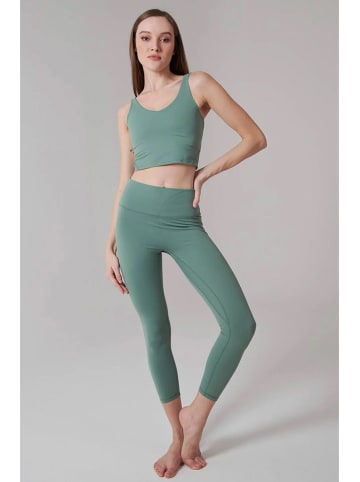 Onamaste Legginsy sportowe w kolorze zielonym