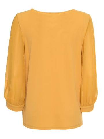 Calvin Klein Bluzka w kolorze żółtym
