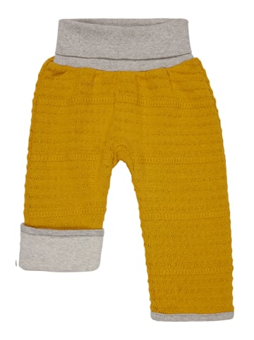 loud + proud Dwustronne spodnie dresowe w kolorze żółtym
