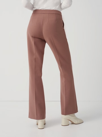 Someday Spodnie "Cavide" w kolorze szaroróżowym