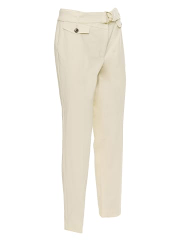 Calvin Klein Spodnie w kolorze kremowym