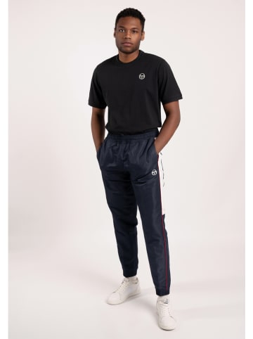 Sergio Tacchini Spodnie sportowe "Alabama" w kolorze granatowym