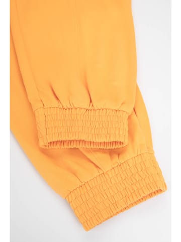 MOKIDA Spodnie dresowe w kolorze żółtym
