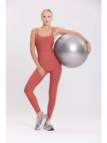 Onamaste Legginsy sportowe w kolorze koralowym