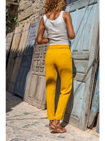 Gunes Kizi Spodnie w kolorze żółtym