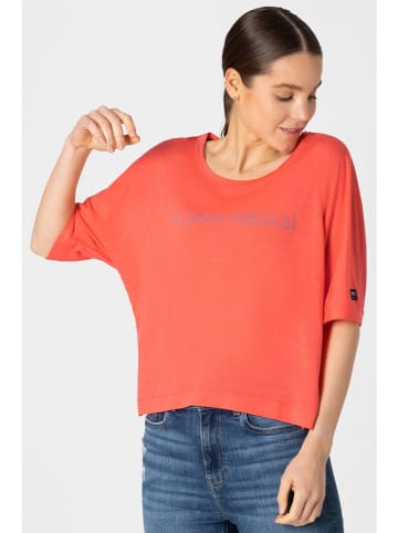 super.natural Koszulka sportowa "Liquid Flow" w kolorze pomarańczowym