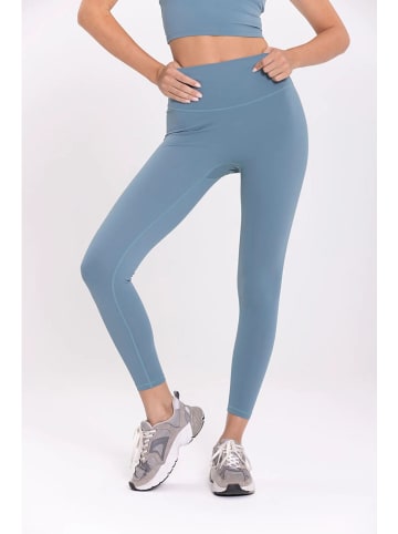 Onamaste Legginsy sportowe "Mantra" w kolorze błękitnym