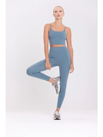 Onamaste Legginsy sportowe "Mantra" w kolorze błękitnym