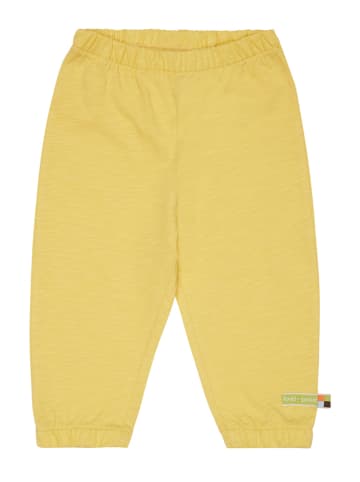 loud + proud Spodnie dresowe w kolorze żółtym