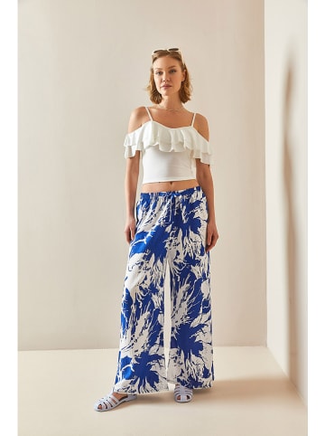 Chezalou Spodnie w kolorze niebiesko-białym
