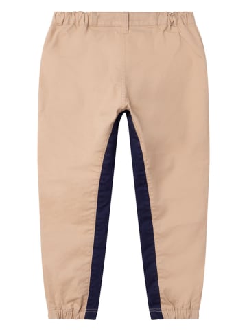 Timberland Spodnie w kolorze beżowym