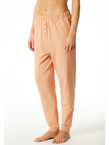 Schiesser Spodnie piżamowe w kolorze brzoskwiniowym