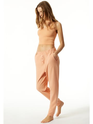 Schiesser Spodnie piżamowe w kolorze brzoskwiniowym