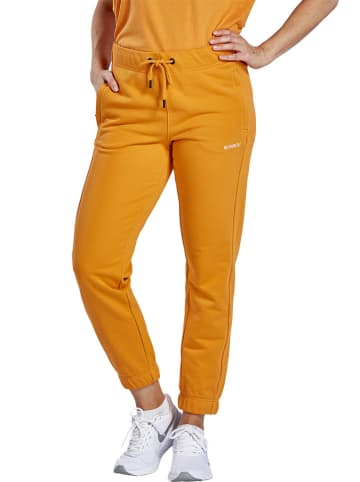 erima Spodnie dresowe "Comfy" w kolorze pomarańczowym