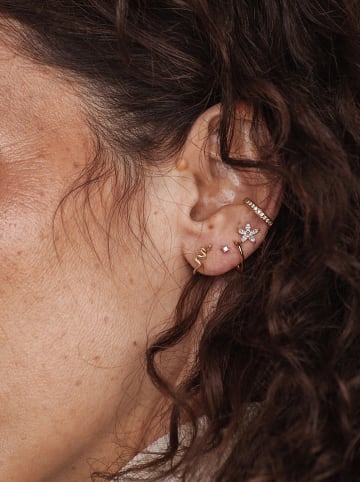 Ania Kruk Vergold. Piercing mit Edelsteinen