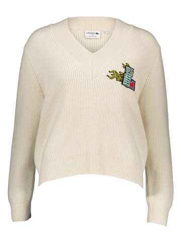 Lacoste Wełniany sweter w kolorze kremowym