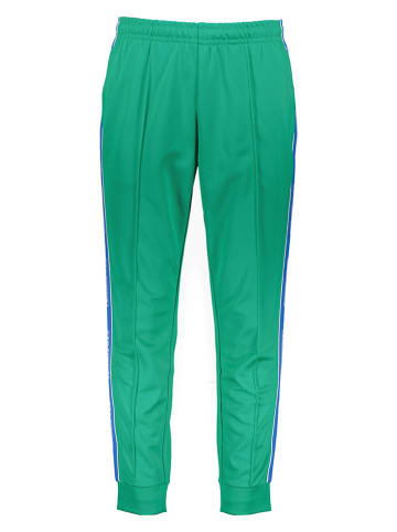 Lacoste Spodnie dresowe w kolorze zielonym